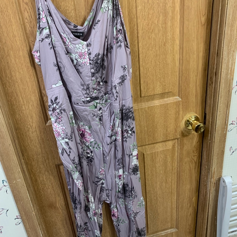 Brand new never worn romper.